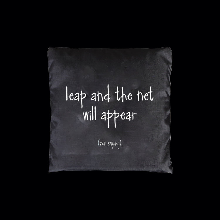 "leap and the net will appear" fold-up bag
