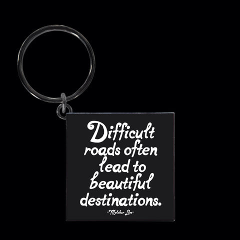 "difficult roads" keychain